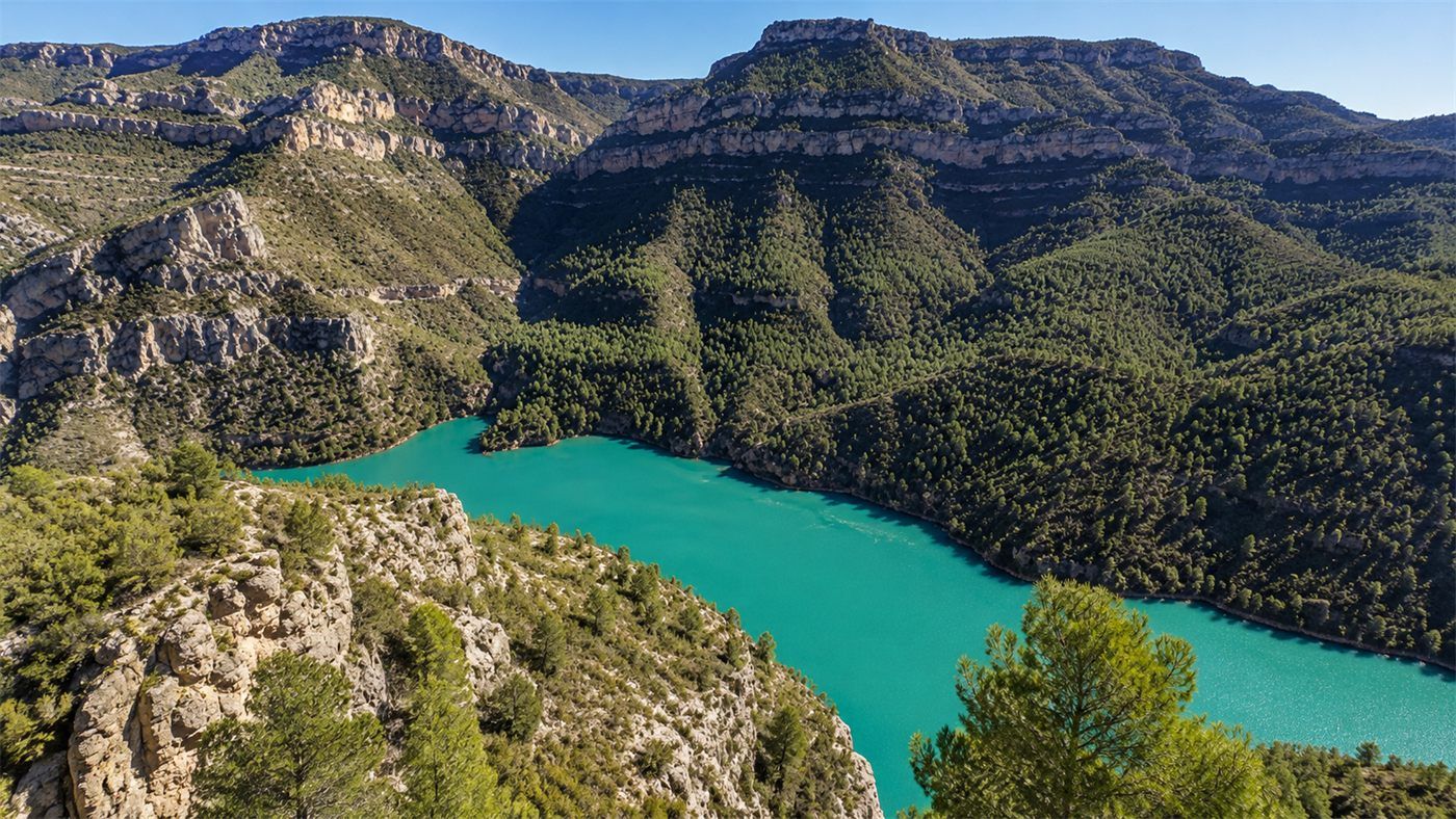 Turquoise water and mountain canyon landscape in Cortes de Pallás near Valencia